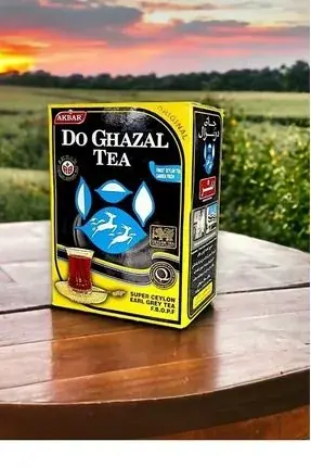 Kokulu Do Hazal Tea siyah çay 500 gr kutusu ve geleneksel çay sunumu görseli